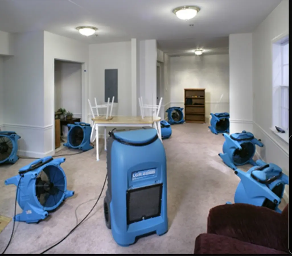 Air movers and dehumidifier setup for Water Damage Restoration in Poplar Grove