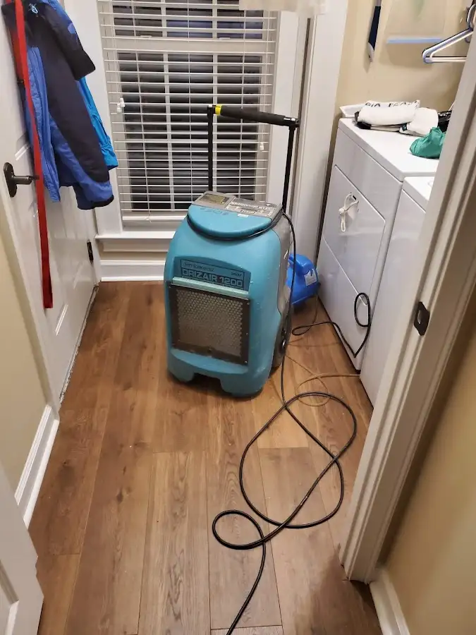 Commercial dehumidifier deployed for Flood Damage Cleanup in Poplar Grove